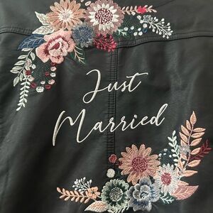 Like new “ just married “ embroidered faux leather jacket David’s bridal